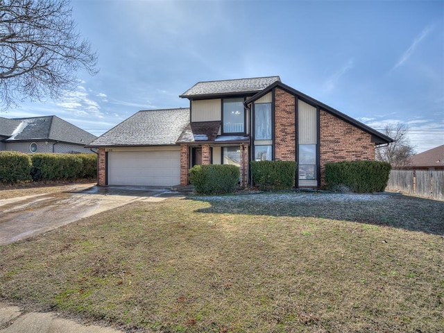 1108 SW 118th Pl, Oklahoma City, OK 73170 - view of front facade with concrete driveway, brick siding, and an attached garage
