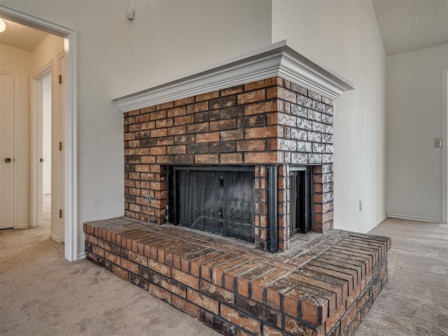 1108 SW 118th Pl, Oklahoma City, OK 73170 - detailed view of carpet floors, a fireplace, and baseboards