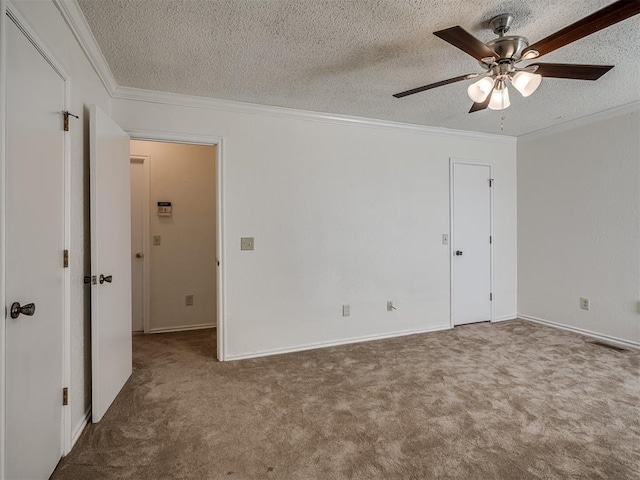 1108 SW 118th Pl, Oklahoma City, OK 73170 - carpeted empty room featuring ornamental molding, a ceiling fan, a textured ceiling, and baseboards