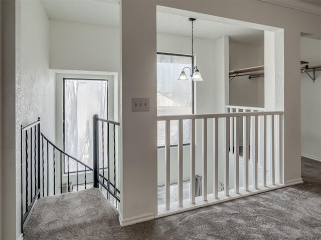 1108 SW 118th Pl, Oklahoma City, OK 73170 - hall with carpet and a chandelier