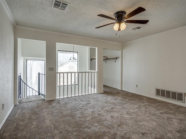 1108 SW 118th Pl, Oklahoma City, OK 73170 - empty room with crown molding, carpet floors, ceiling fan, a textured ceiling, and baseboards