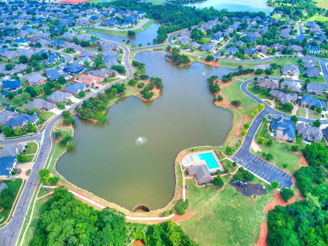 7612 NW 134th St, Oklahoma City, OK 73142 - aerial view of property and surrounding area with a nearby body of water