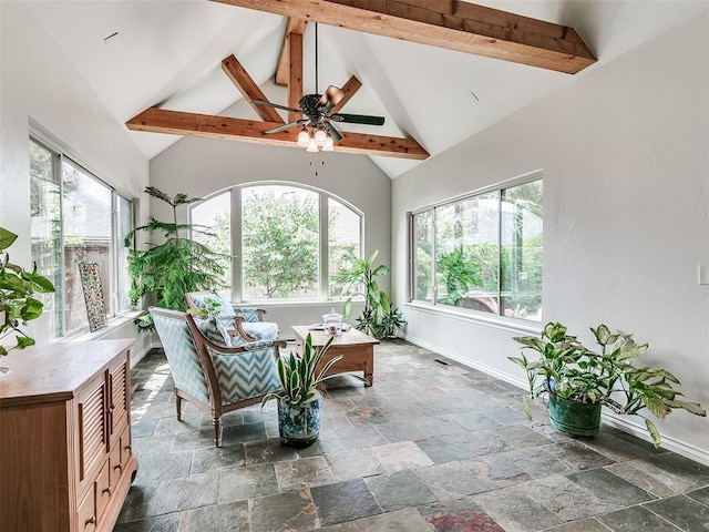 7612 NW 134th St, Oklahoma City, OK 73142 - sunroom with healthy amount of natural light, baseboards, stone tile floors, beamed ceiling, and high vaulted ceiling