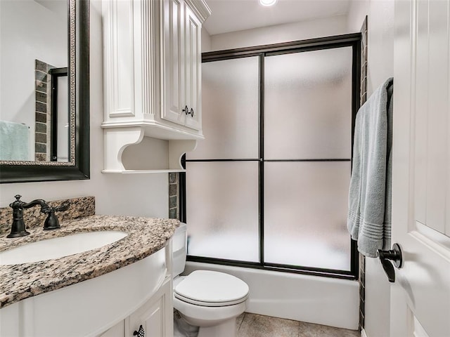 7612 NW 134th St, Oklahoma City, OK 73142 - bathroom with vanity, combined bath / shower with glass door, and toilet