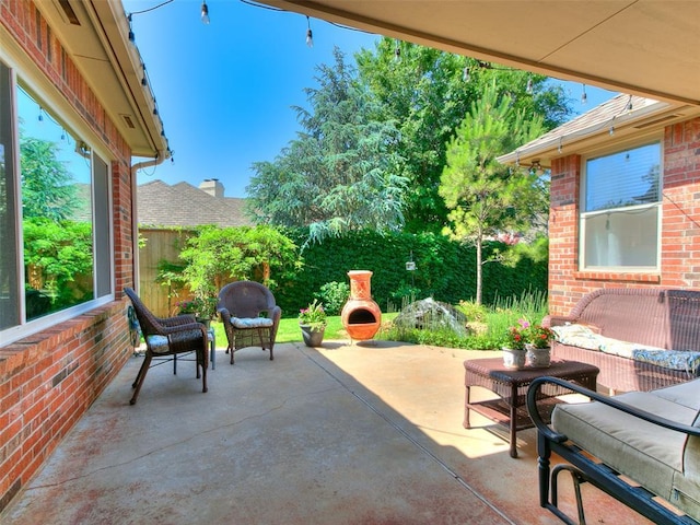 7612 NW 134th St, Oklahoma City, OK 73142 - view of patio featuring an outdoor living space