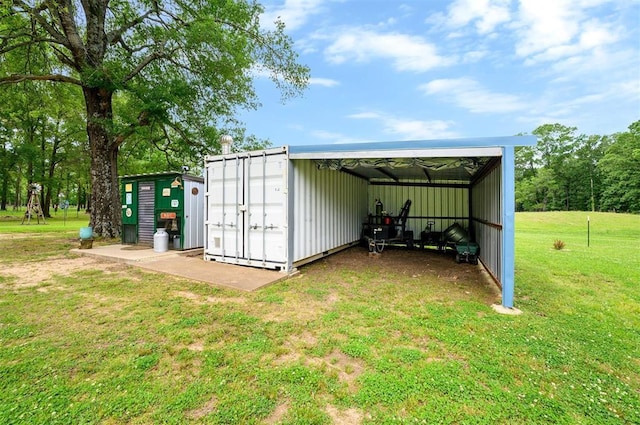 2590 Old 21 Rd, Idabel, OK 74745 - view of pole building featuring a yard and a detached carport