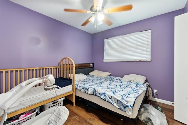 3217 NW 34th St, Oklahoma City, OK 73112 - bedroom featuring wood finished floors, baseboards, and ceiling fan