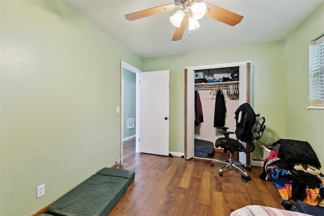 3217 NW 34th St, Oklahoma City, OK 73112 - bedroom featuring wood finished floors, a closet, and ceiling fan
