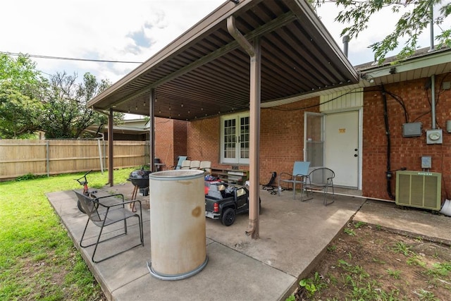3217 NW 34th St, Oklahoma City, OK 73112 - view of patio / terrace featuring french doors and central AC