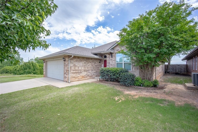 1528 Fawn Run Xing, Norman, OK 73071 - view of front of property with brick siding, driveway, an attached garage, and roof with shingles