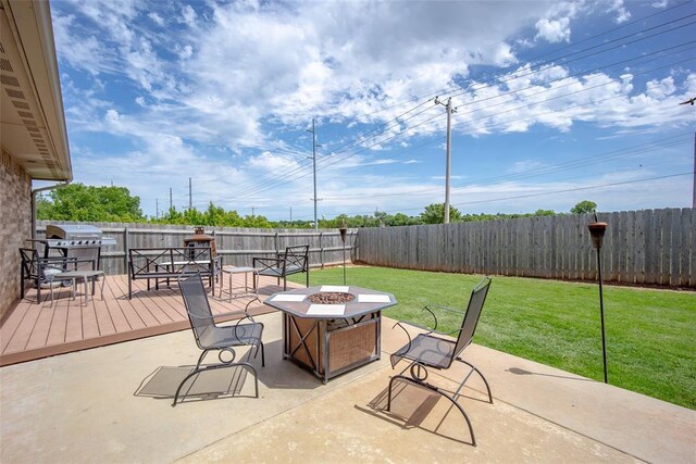 1528 Fawn Run Xing, Norman, OK 73071 - view of patio with a fire pit, a wooden deck, and a grill