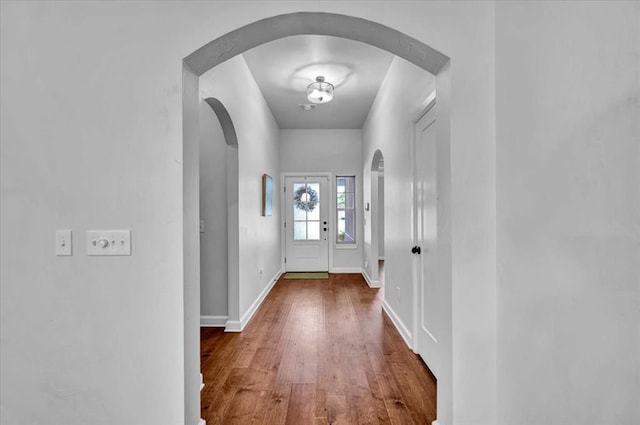 12824 NW 4th Ter, Yukon, OK 73099 - foyer featuring arched walkways and wood finished floors