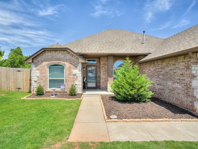 12005 NW 139th St, Piedmont, OK 73078 - view of front of home with roof with shingles and brick siding