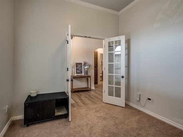 12005 NW 139th St, Piedmont, OK 73078 - unfurnished room featuring arched walkways, carpet flooring, crown molding, and baseboards