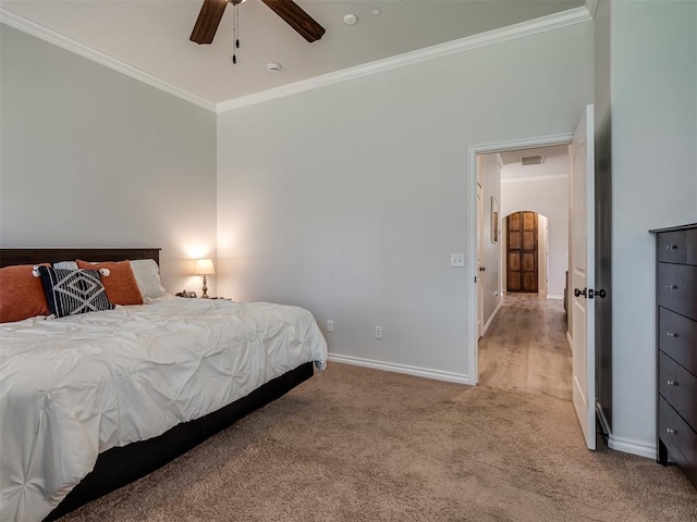 12005 NW 139th St, Piedmont, OK 73078 - bedroom featuring crown molding, baseboards, light colored carpet, and a ceiling fan