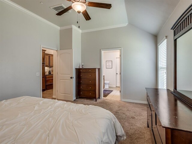 12005 NW 139th St, Piedmont, OK 73078 - bedroom with light colored carpet, lofted ceiling, baseboards, connected bathroom, and ornamental molding