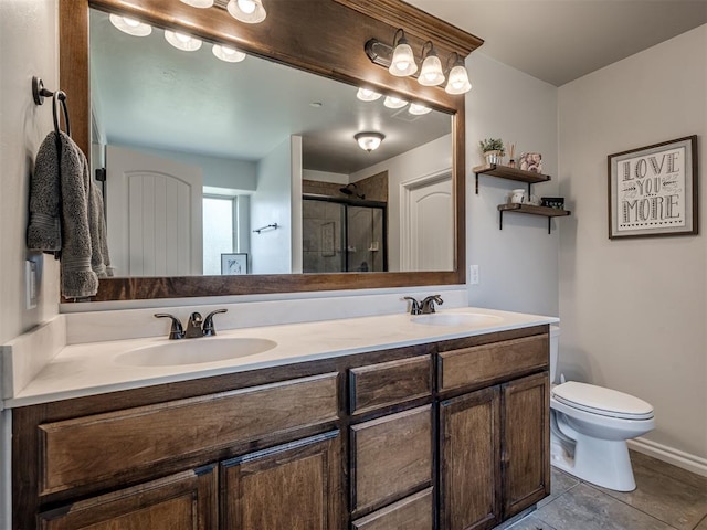12005 NW 139th St, Piedmont, OK 73078 - full bathroom with a shower stall, double vanity, toilet, and tile patterned flooring