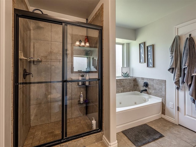 12005 NW 139th St, Piedmont, OK 73078 - full bathroom with a jetted tub, a shower stall, tile patterned floors, and baseboards