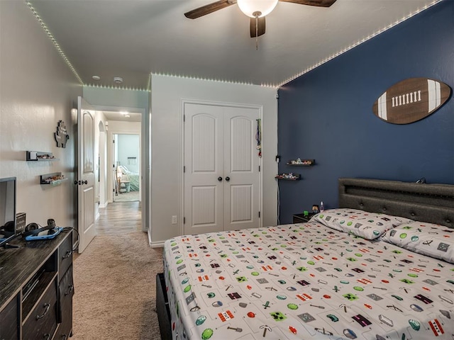 12005 NW 139th St, Piedmont, OK 73078 - carpeted bedroom with a closet, ceiling fan, and baseboards