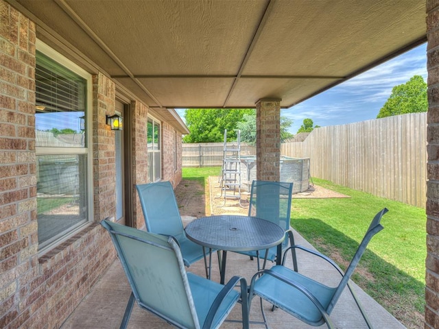 12005 NW 139th St, Piedmont, OK 73078 - view of patio / terrace with outdoor dining area