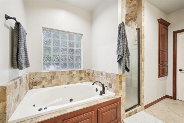 1701 Tifton Dr, Edmond, OK 73012 - bathroom with a shower stall, a jetted tub, and tile patterned flooring