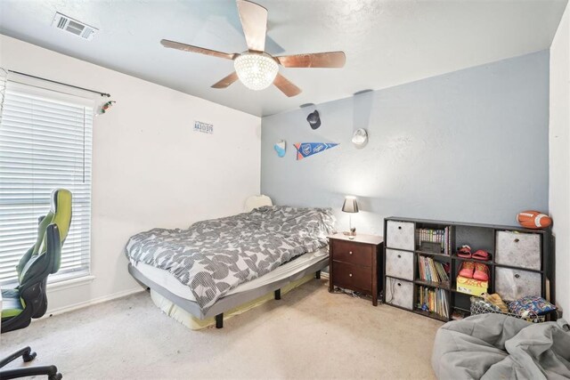 1701 Tifton Dr, Edmond, OK 73012 - bedroom with carpet floors and ceiling fan