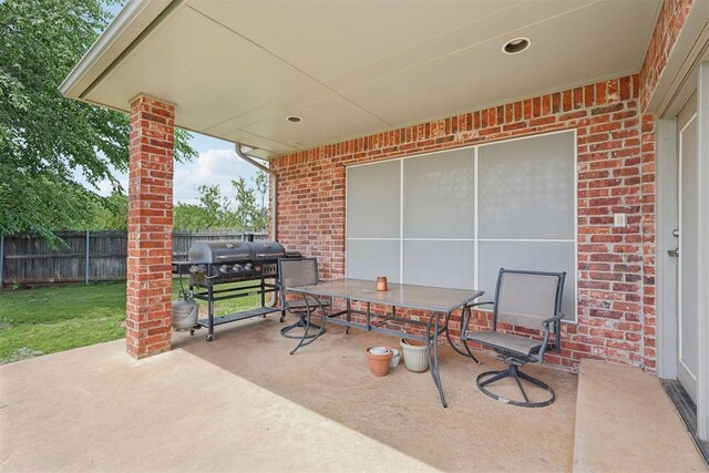 1701 Tifton Dr, Edmond, OK 73012 - view of patio / terrace with fence and outdoor dining area