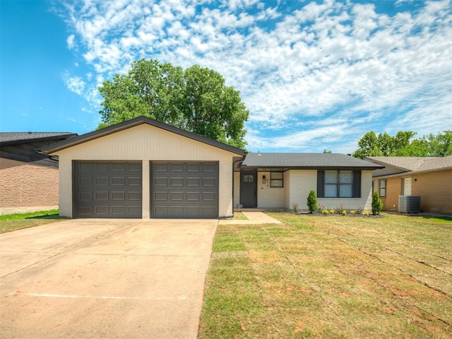 813 Branchwood Ct, Norman, OK 73072 - single story home with an attached garage, cooling unit, concrete driveway, a front lawn, and brick siding