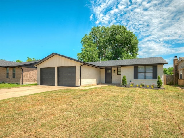 813 Branchwood Ct, Norman, OK 73072 - single story home with a garage, concrete driveway, and brick siding