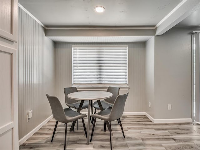 813 Branchwood Ct, Norman, OK 73072 - dining area with light wood-type flooring, baseboards, and crown molding