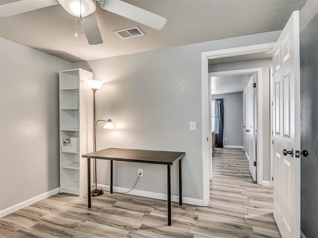 813 Branchwood Ct, Norman, OK 73072 - hallway featuring wood finished floors and baseboards