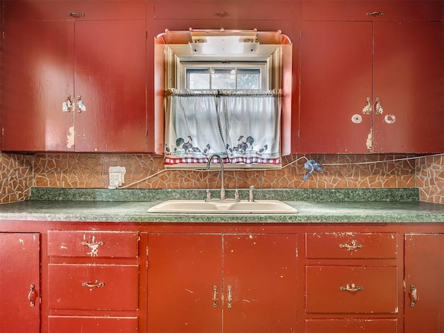 1132 SW 25th St, Oklahoma City, OK 73109 - kitchen featuring a sink and backsplash
