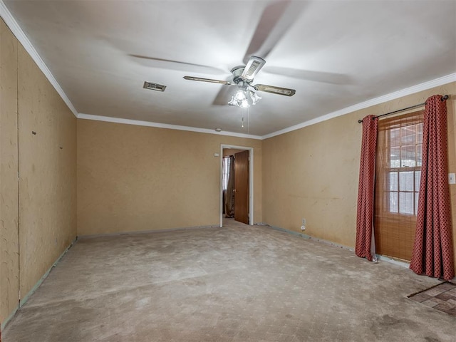 1132 SW 25th St, Oklahoma City, OK 73109 - carpeted empty room with a ceiling fan and ornamental molding