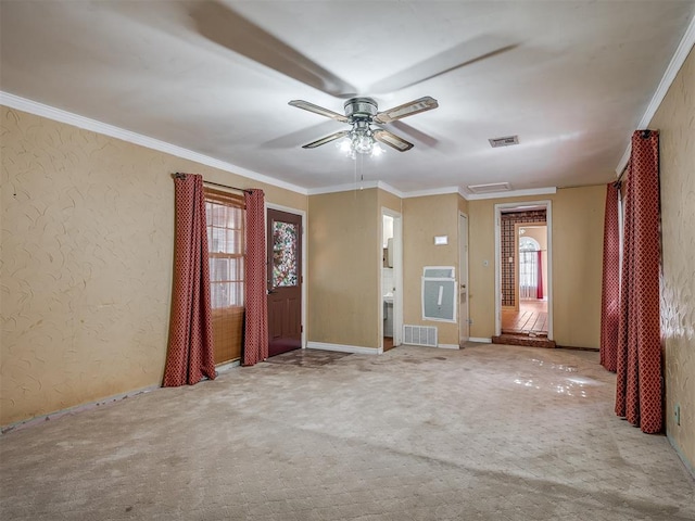 1132 SW 25th St, Oklahoma City, OK 73109 - unfurnished room with a ceiling fan, carpet flooring, ornamental molding, and baseboards