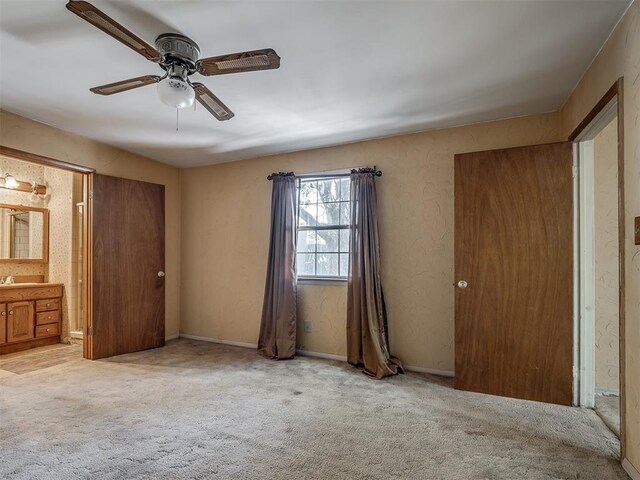 1132 SW 25th St, Oklahoma City, OK 73109 - unfurnished bedroom with carpet, ensuite bath, and ceiling fan