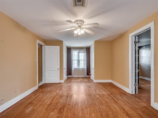1132 SW 25th St, Oklahoma City, OK 73109 - spare room with ceiling fan, baseboards, and light wood finished floors