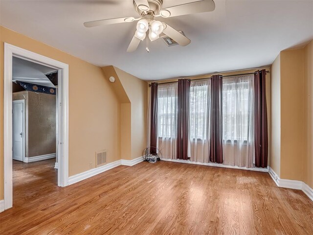 1132 SW 25th St, Oklahoma City, OK 73109 - unfurnished room with a ceiling fan, light wood-style floors, and baseboards