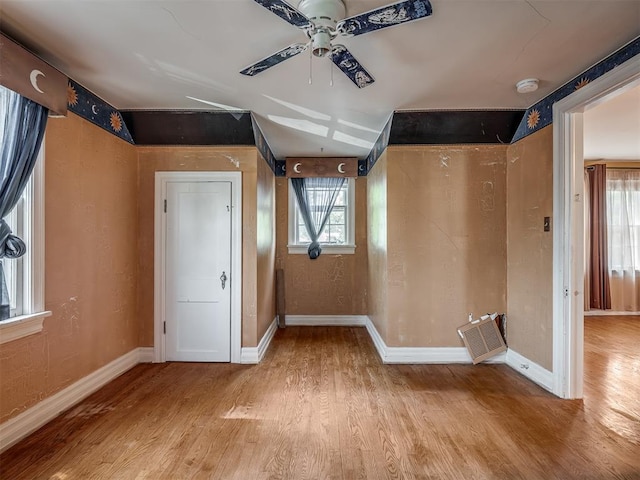 1132 SW 25th St, Oklahoma City, OK 73109 - empty room featuring light wood-style flooring, a ceiling fan, a smoke detector, and baseboards