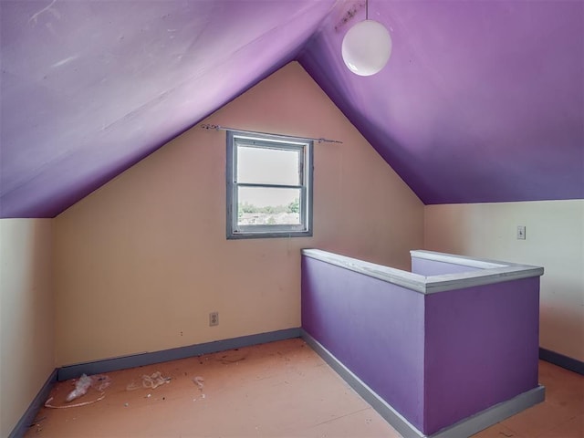 1132 SW 25th St, Oklahoma City, OK 73109 - bonus room featuring baseboards and vaulted ceiling