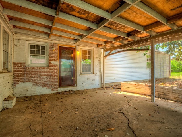 1132 SW 25th St, Oklahoma City, OK 73109 - view of exterior entry featuring brick siding