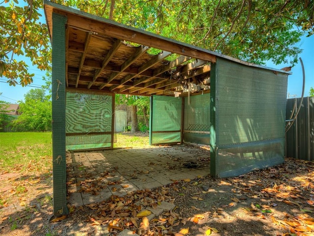 1132 SW 25th St, Oklahoma City, OK 73109 - view of patio / terrace with an outdoor structure and fence