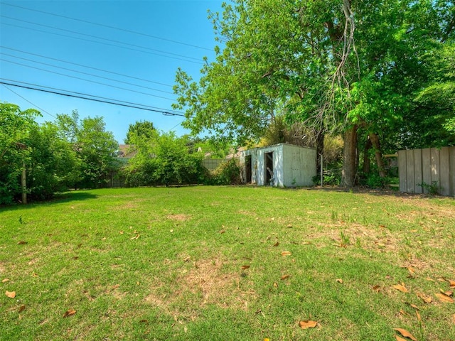 1132 SW 25th St, Oklahoma City, OK 73109 - view of yard featuring a storage unit and an outbuilding
