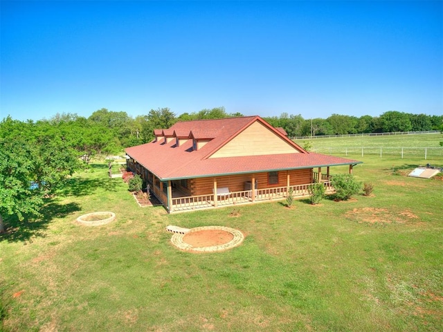 log cabin with a porch