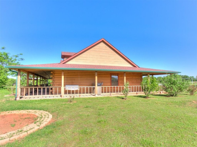 view of front of house featuring log exterior