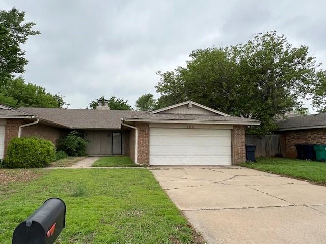 7909 Harvest Moon Rd, Oklahoma City, OK 73132 - ranch-style home featuring brick siding, an attached garage, a front yard, concrete driveway, and a chimney