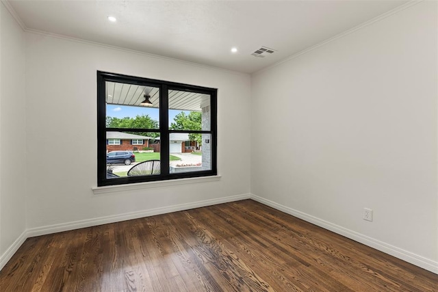 3236 NW 68th St, Oklahoma City, OK 73116 - spare room featuring dark wood-type flooring, baseboards, crown molding, and recessed lighting
