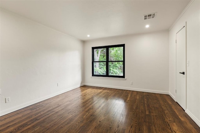 3236 NW 68th St, Oklahoma City, OK 73116 - unfurnished room with crown molding, dark wood finished floors, baseboards, and recessed lighting