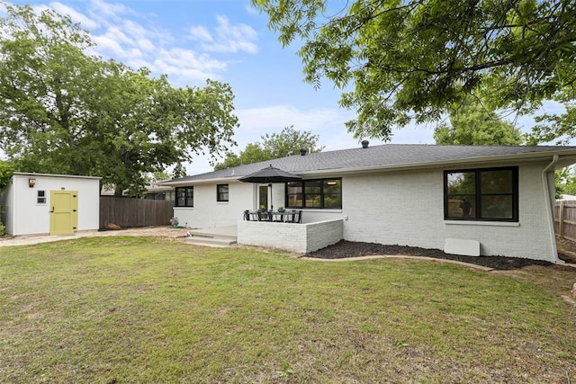 3236 NW 68th St, Oklahoma City, OK 73116 - back of property featuring brick siding and a patio area