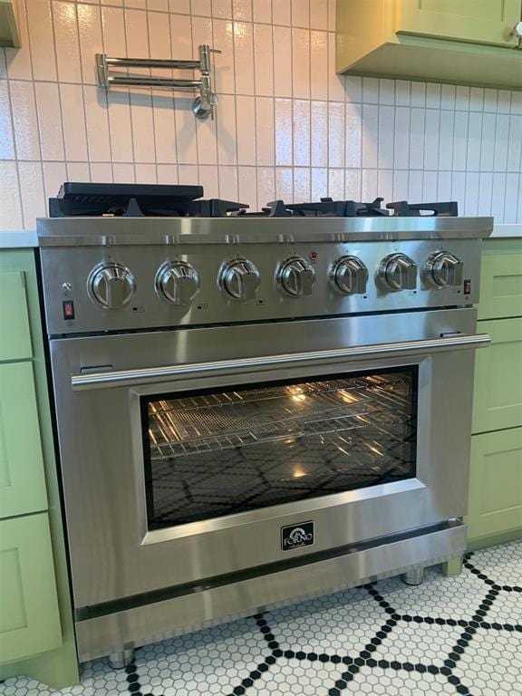 3236 NW 68th St, Oklahoma City, OK 73116 - detailed view of stainless steel stove and decorative backsplash
