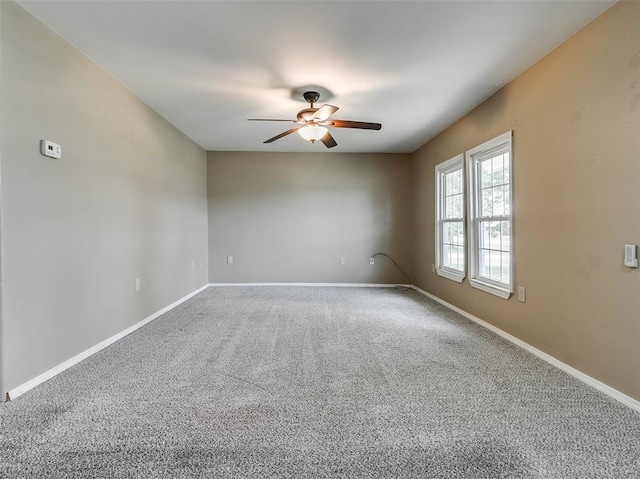 922 W 7th St, Stroud, OK 74079 - unfurnished room featuring a ceiling fan, carpet, and baseboards